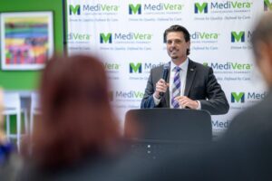 Mayor Ethan Baker speaks during MediVera’s grand opening ribbon cutting ceremony in Troy, Michigan.